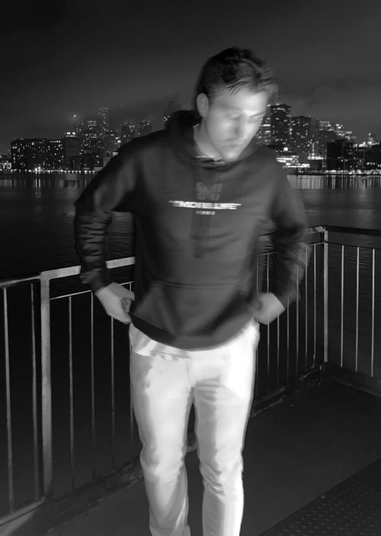 John Keller by the water at night